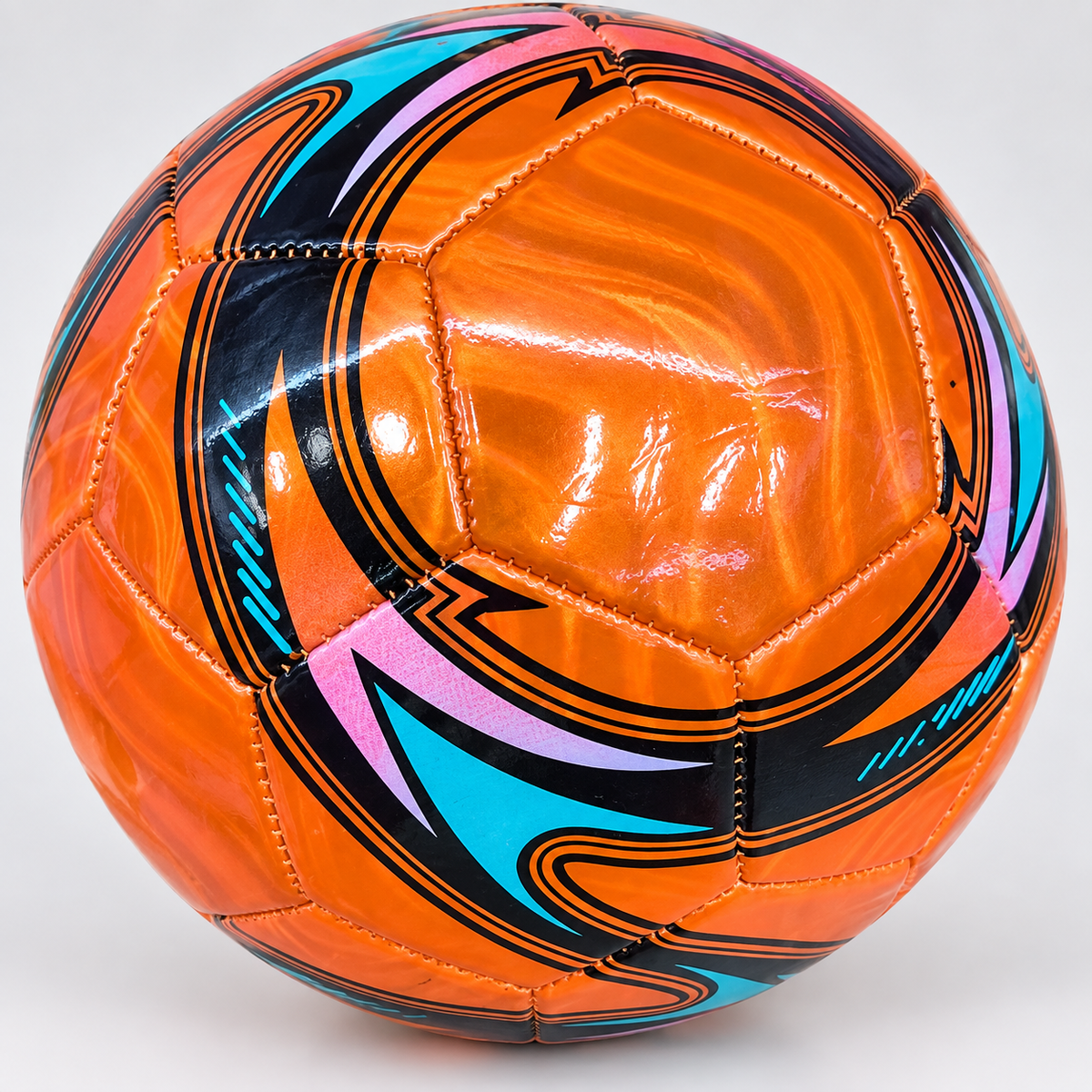 Balón de fútbol naranja con detalles turquesa 23193-4 — detalle del producto