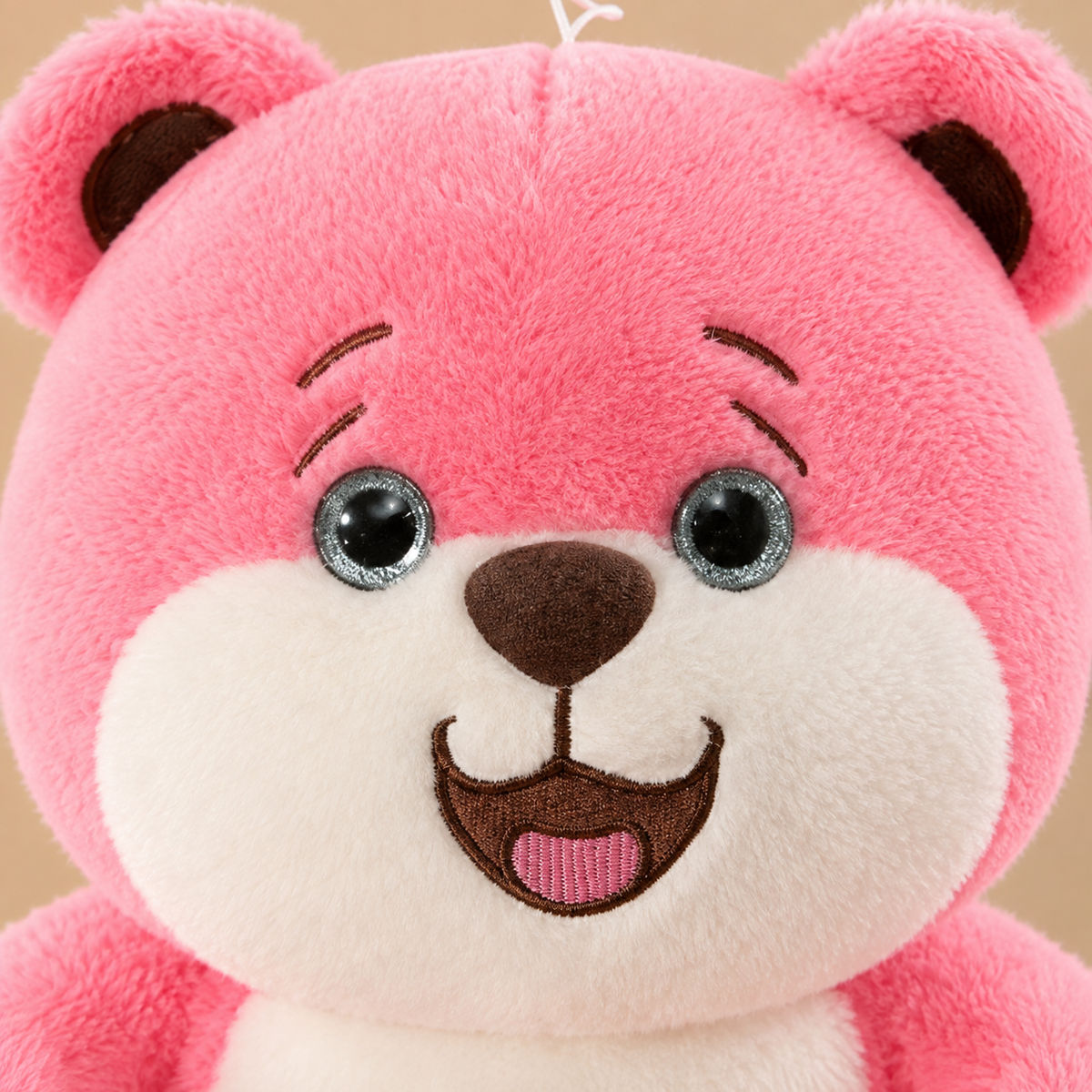 Peluche de oso rosa sonriente 24228-4 — detalle del producto